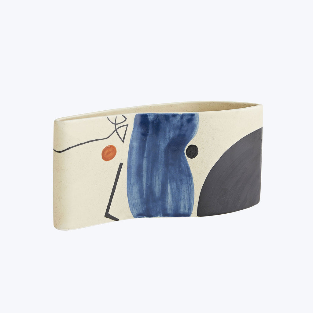 Modern ceramic vase with abstract design in blue, black, and orange.