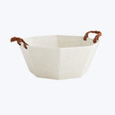 Rustic beige basket with octagonal shape and twisted leather handles.