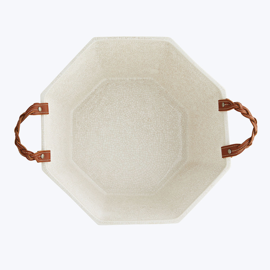 Hexagonal tray with textured surface, rope handles for rustic charm.
