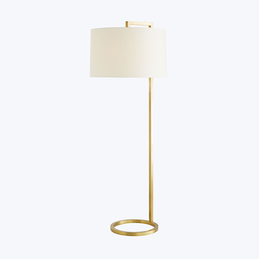 Sleek and minimalist floor lamp with metallic gold finish.