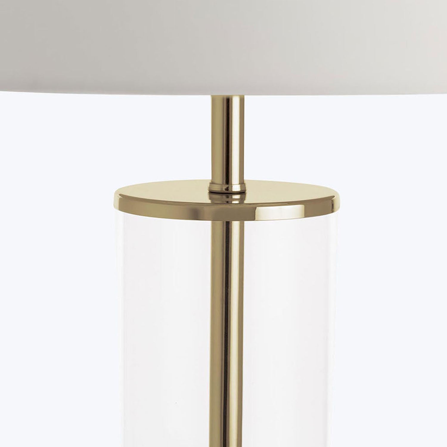 Modern lamp with gold finish and minimalistic design.