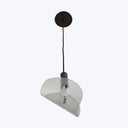 Contemporary pendant light with transparent jagged-textured lampshade and sleek design.