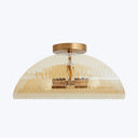 Modern semi-flush mount ceiling light with textured glass cover.