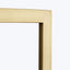 Close-up of a modern, minimalistic gold picture frame with fine craftsmanship.