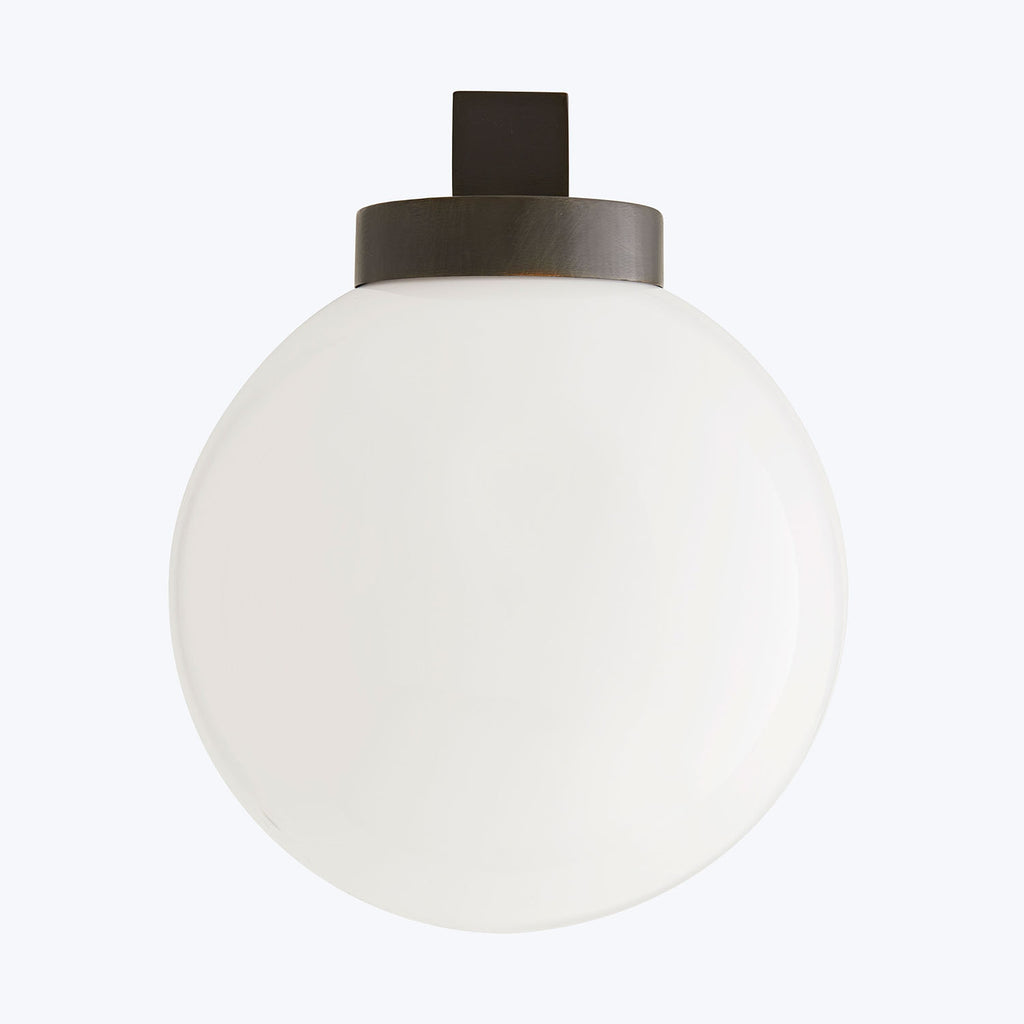 Minimalist, modern white translucent light fixture emits soft diffused glow.