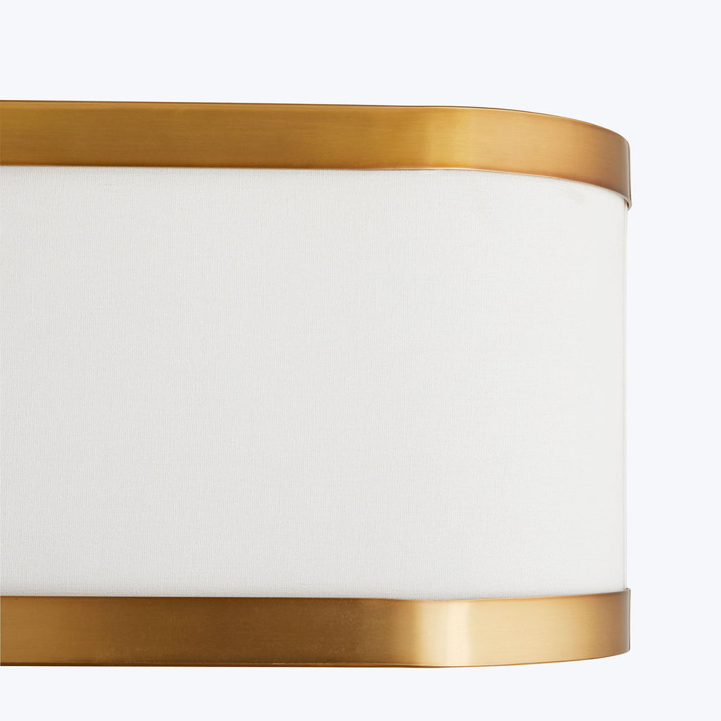Close-up of elegant gold metal frame with cream fabric interior.