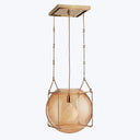 Sleek and contemporary pendant light with amber glass shade.
