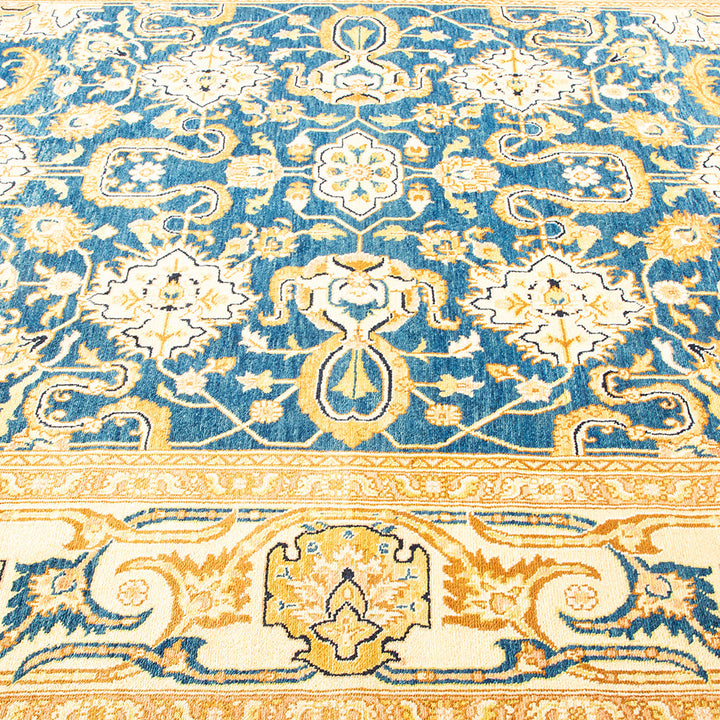 Close-up of an ornate Oriental carpet showcasing intricate designs.
