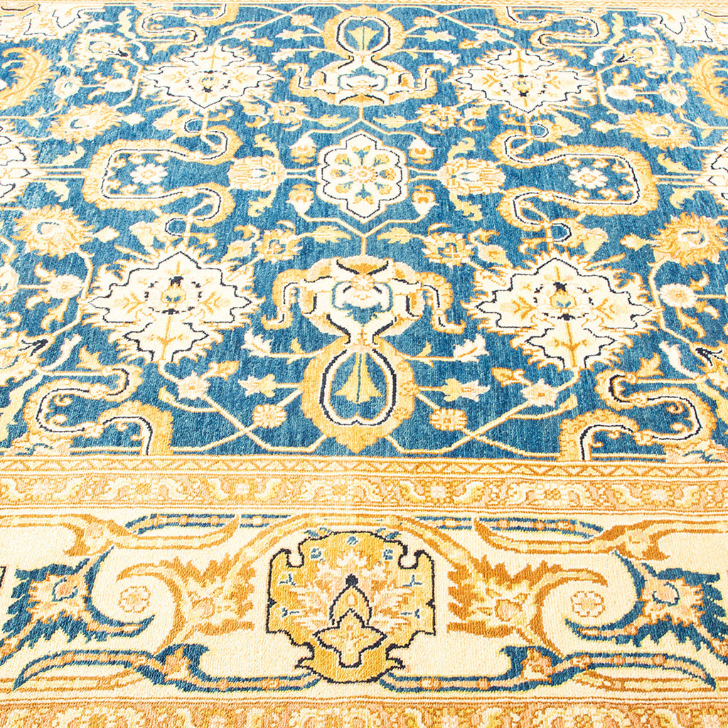Close-up of an ornate Oriental carpet showcasing intricate designs.