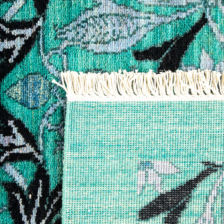Close-up view of a fabric edge, transitioning from plain to patterned.