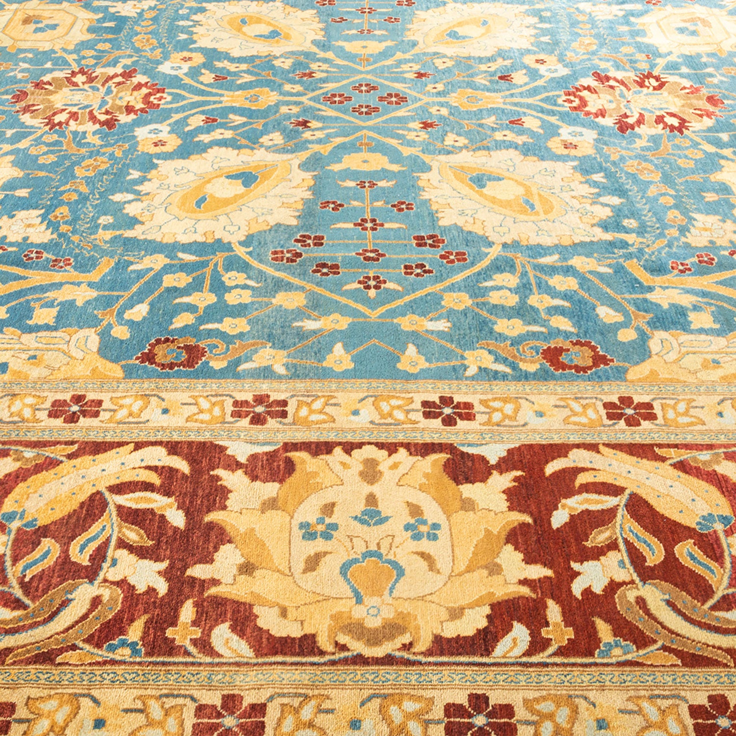 Close-up of a luxurious Persian-inspired carpet with intricate designs