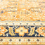 Close-up of an ornately patterned carpet with vibrant floral motifs