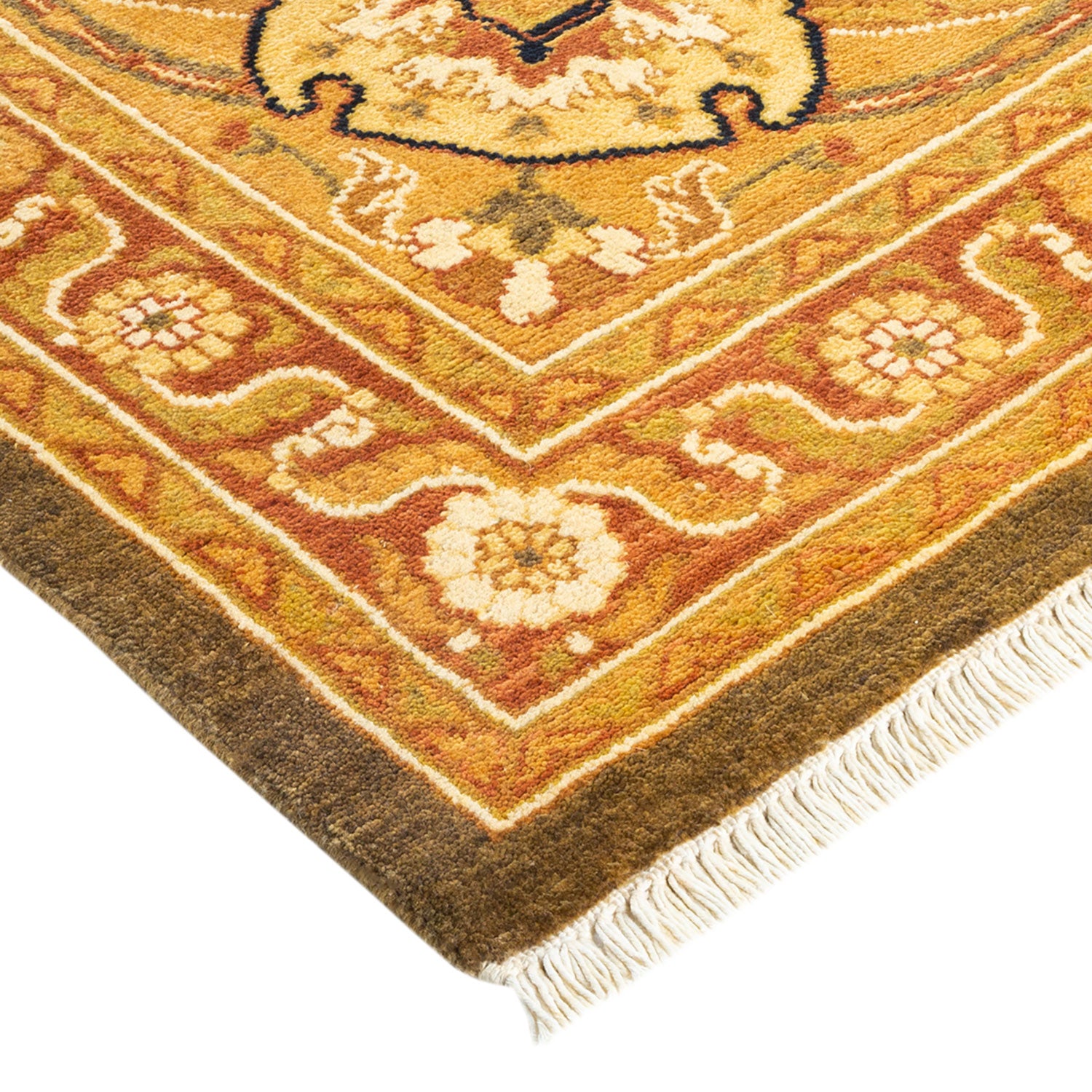 Close-up of vibrant, intricate rug with geometric and floral patterns.