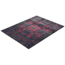 Vintage-inspired distressed rug featuring traditional patterns and vibrant hues.