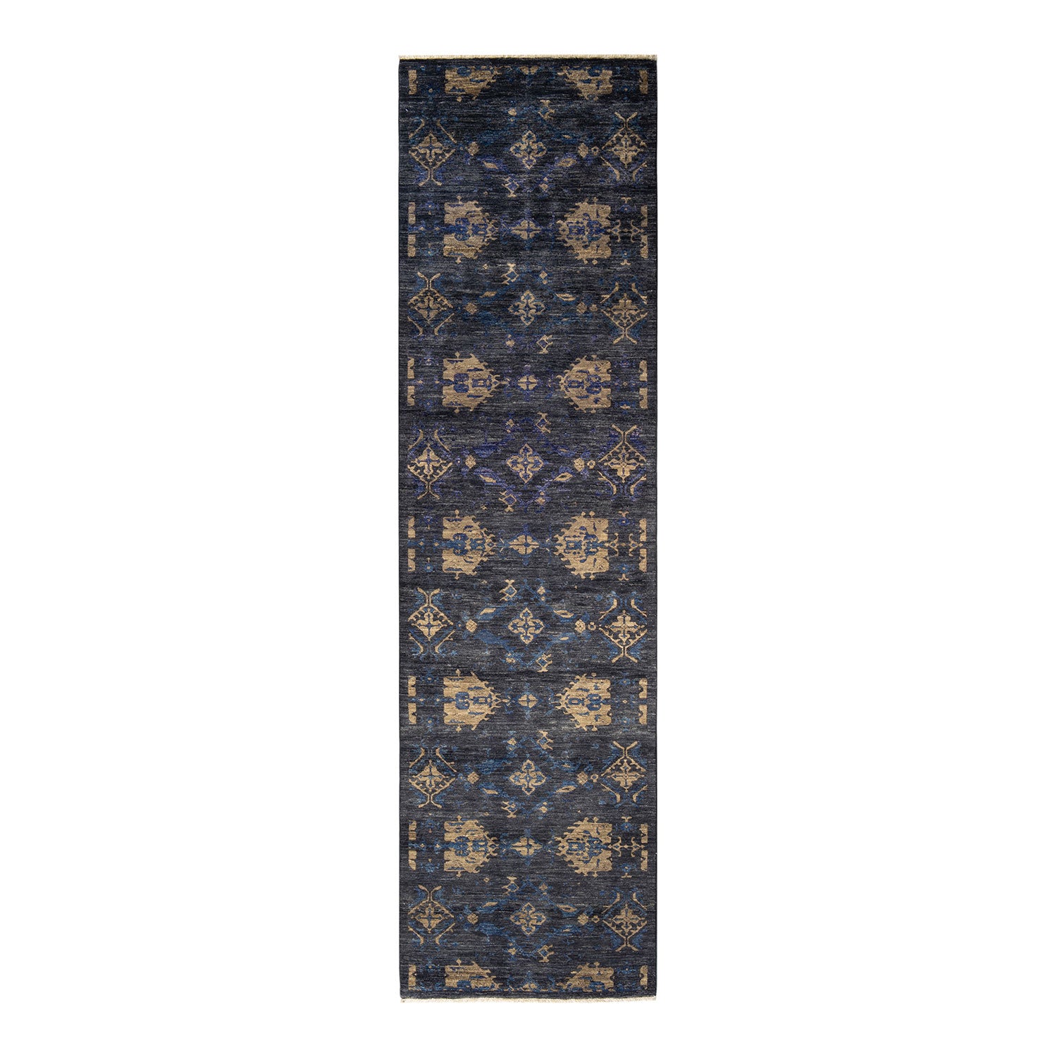 An ornate rectangular rug with repeating geometric and floral motifs.