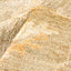 Close-up of plush, neutral-toned fabric with organic variegated texture.
