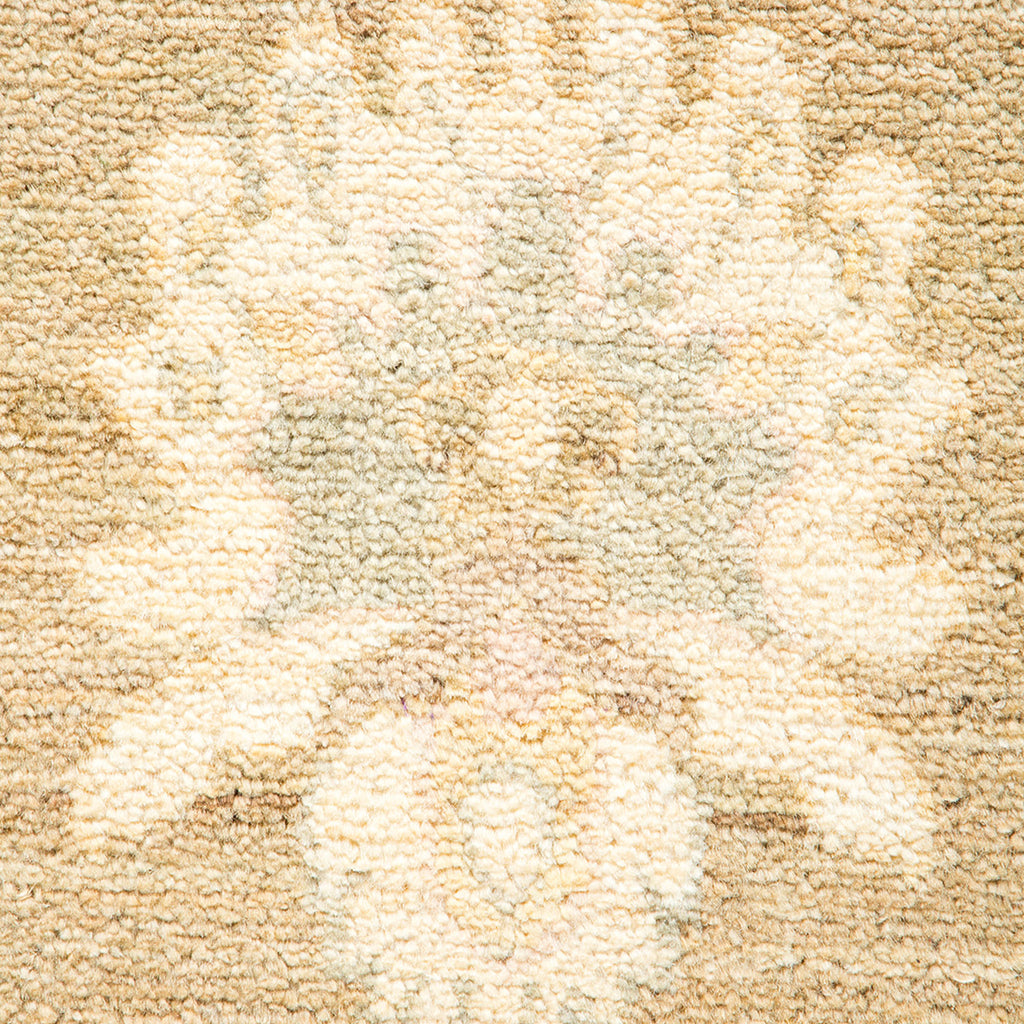 Close-up of plush, textured carpet featuring natural muted colors.