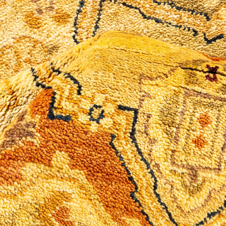 Close-up view of a plush, dense carpet with intricate pattern.