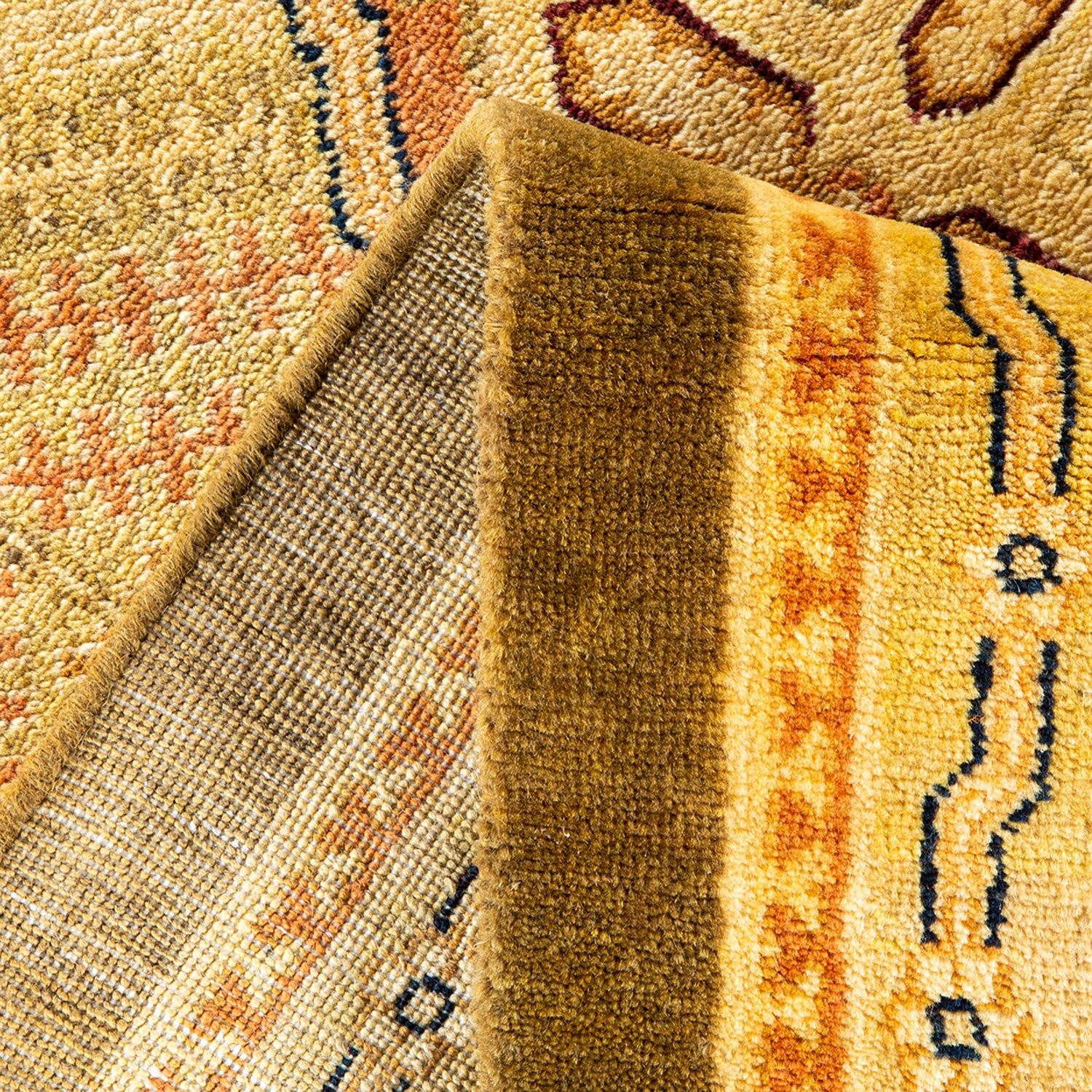 Close-up of a soft and dense rug with intricate patterns