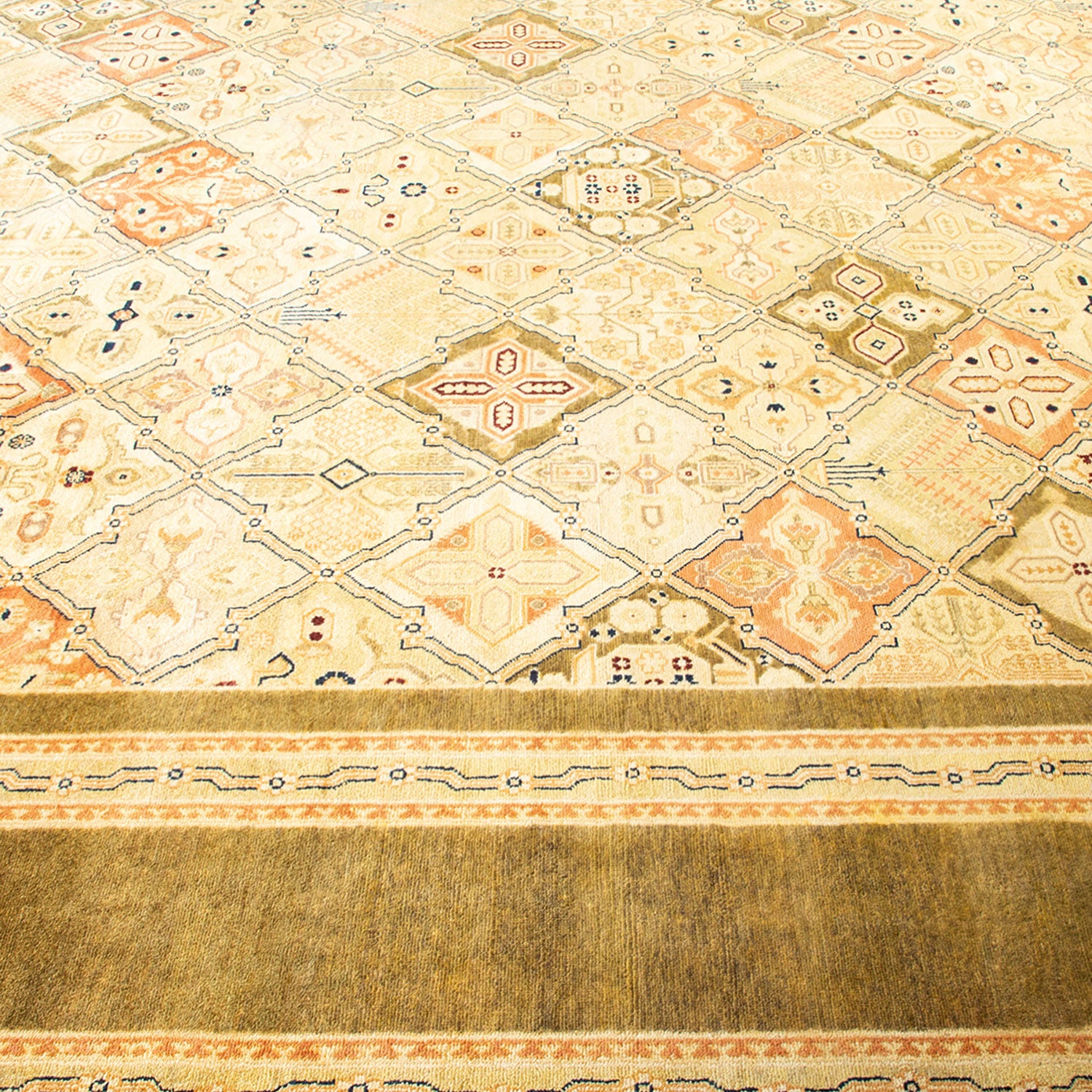 Intricate handcrafted rug featuring geometric patterns and warm earth tones.