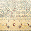 Exquisite hand-woven carpet with vibrant colors and intricate floral motifs.