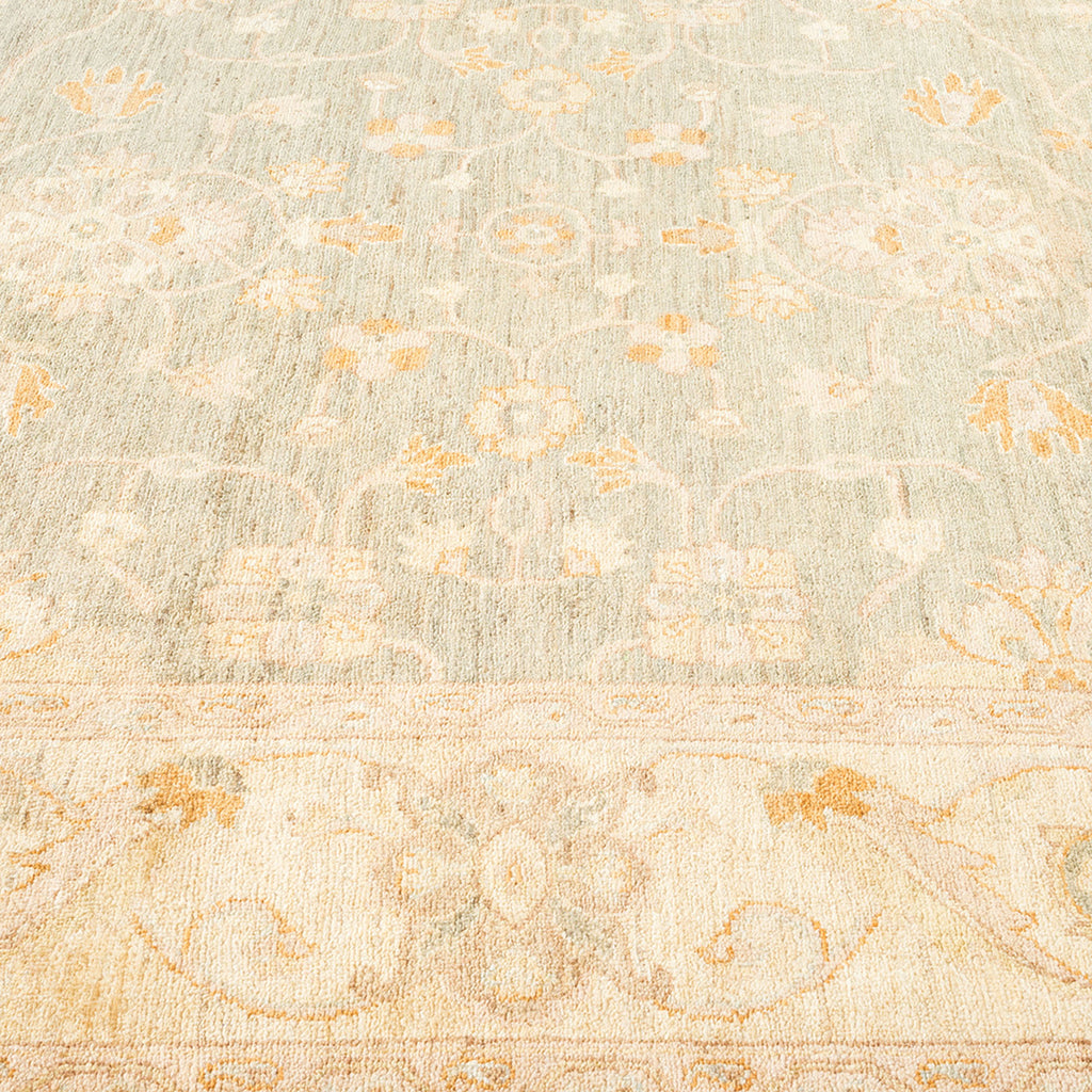 Close-up view of a vintage-inspired textured carpet with floral motifs