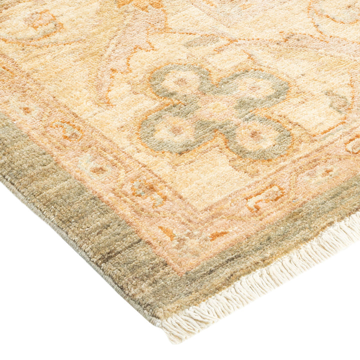 High-quality hand-woven rug with muted tones and intricate design.