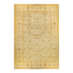 An intricately designed, vintage-looking rug with floral and geometric motifs.