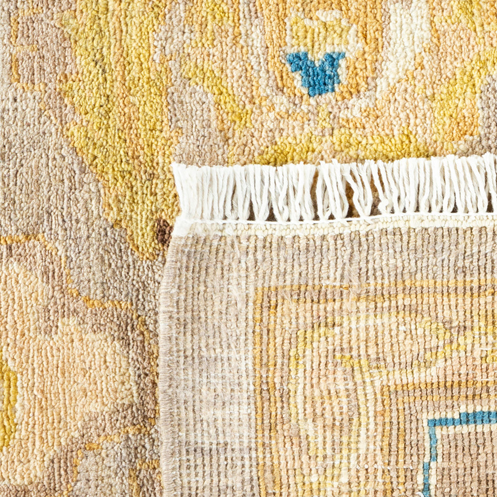 Close-up detail of a vibrant, handwoven textile showcasing intricate patterns.