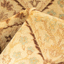 Close-up of a plush, patterned fabric with earthy tones.