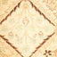 Close-up of a soft, plush carpet with intricate geometric motifs