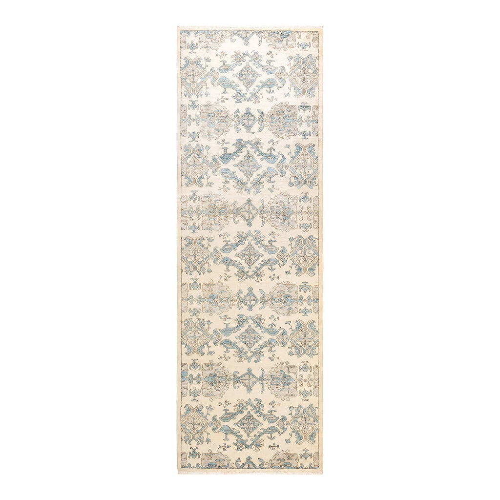 Intricate, blue and beige patterned runner carpet for narrow spaces.