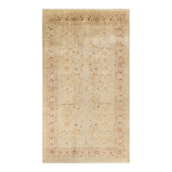 Exquisite handcrafted rug featuring intricate symmetrical patterns and muted tones.