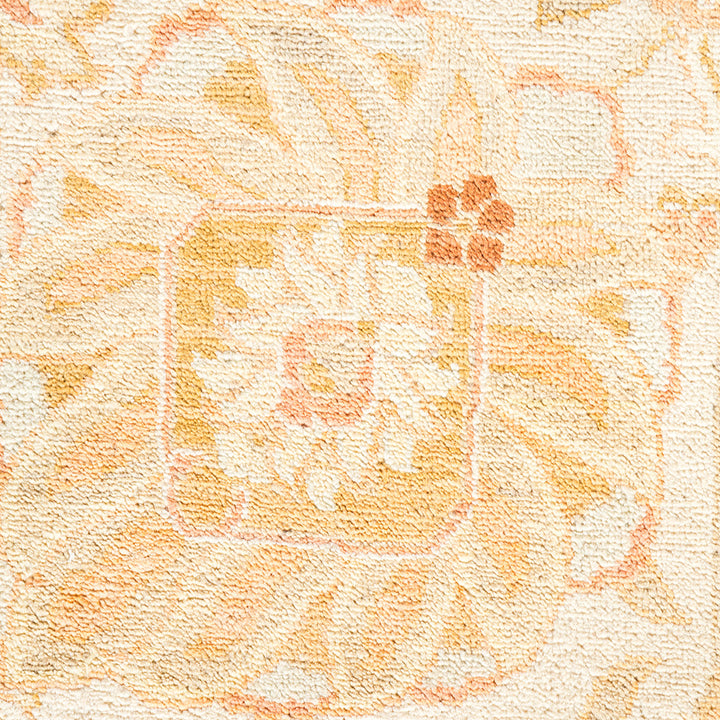 Close-up of a soft, multicolored floral fabric with plush texture.