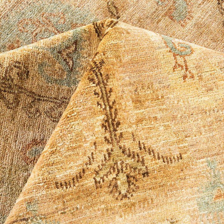 Close-up of a patterned carpet showcases its plush, luxurious texture