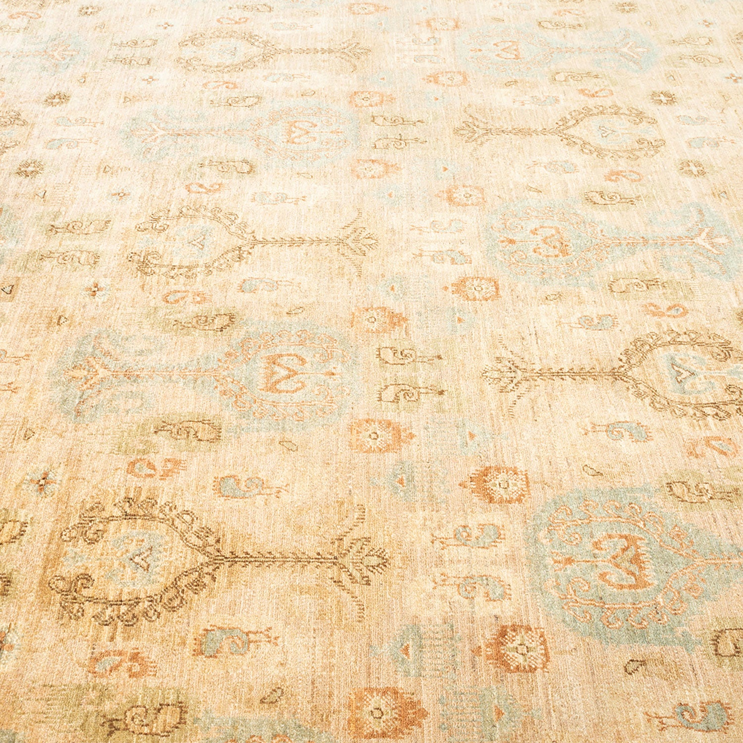 Intricately designed vintage carpet with animal, geometric, and floral motifs.