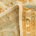 Close-up view of a detailed and textured, traditional carpet design