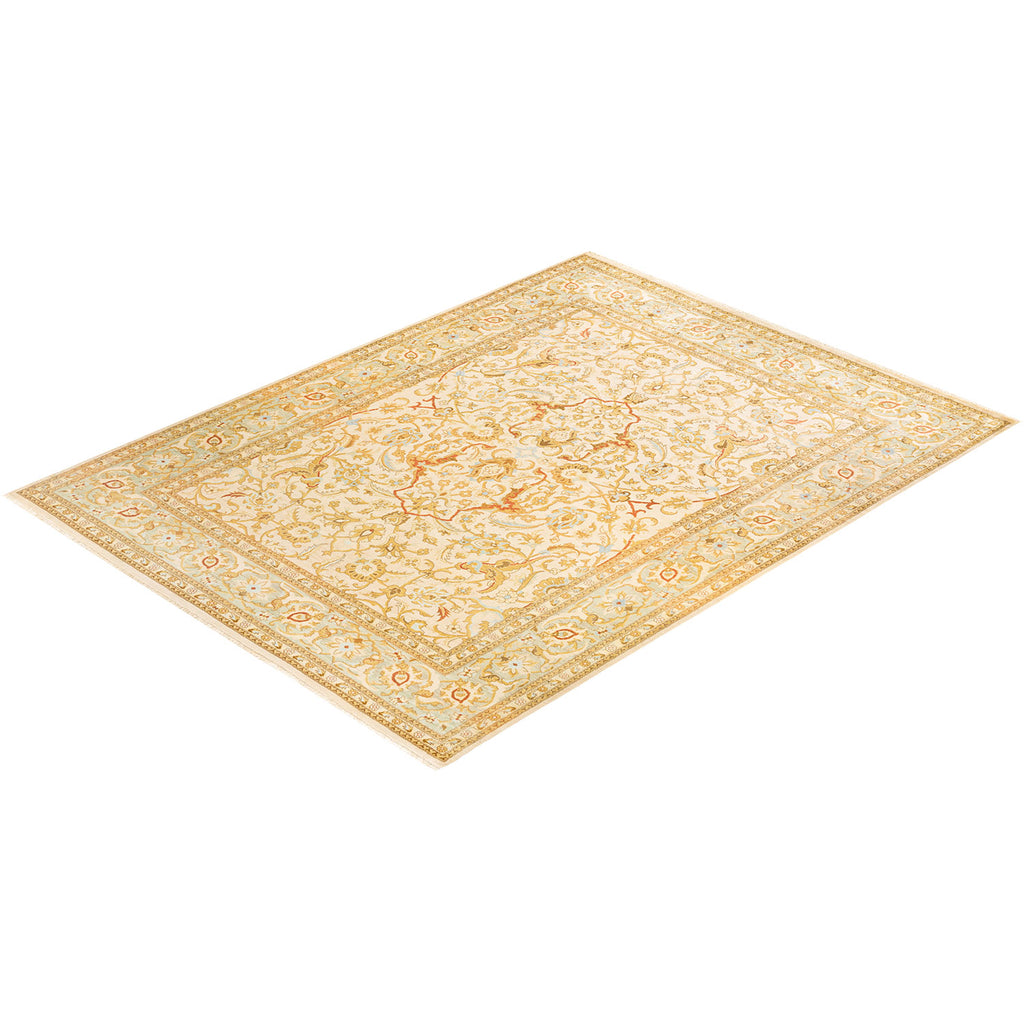 Ornate area rug with intricate symmetrical patterns in soft colors.