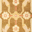 Close-up of a symmetrical floral textile with earthy tones.
