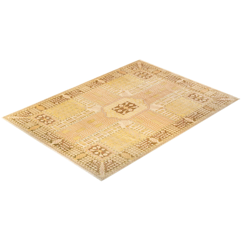 Intricate geometric patterns adorn a gold and beige area rug.