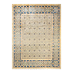 Symmetrical rectangular area rug with intricate floral and geometric patterns.