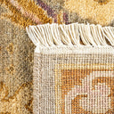 Close-up view of a woven rug showcasing plush texture and intricate patterns.