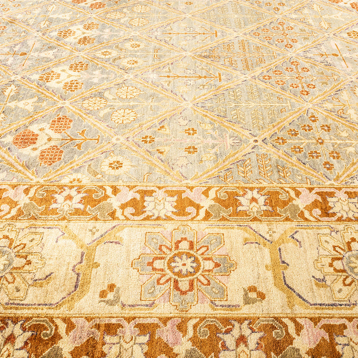 Close-up of an ornate, symmetrical carpet with intricate floral motifs.