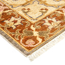 Ornate traditional rug with warm color palette and intricate patterns.