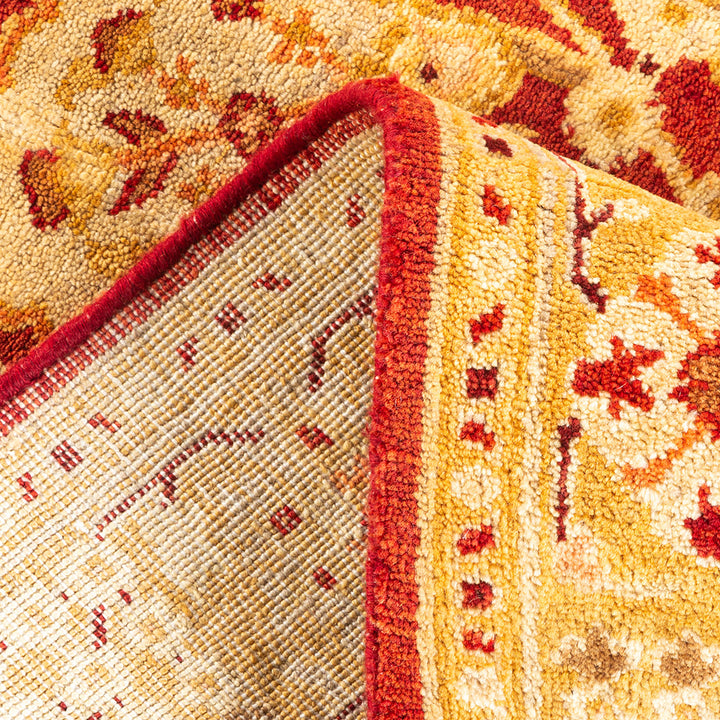 Close-up view of an ornate, well-maintained carpet with intricate patterning.