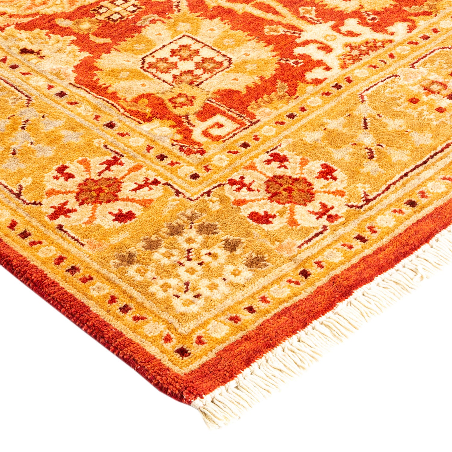 Traditional, ornate rug with intricate patterns and vibrant colors.