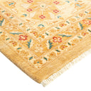 Close-up of traditional woven rug with intricate geometric and floral patterns