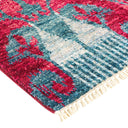 Vibrant traditional rug with floral motifs and plush texture