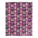 Rich, symmetrical fabric pattern in shades of purple and black.