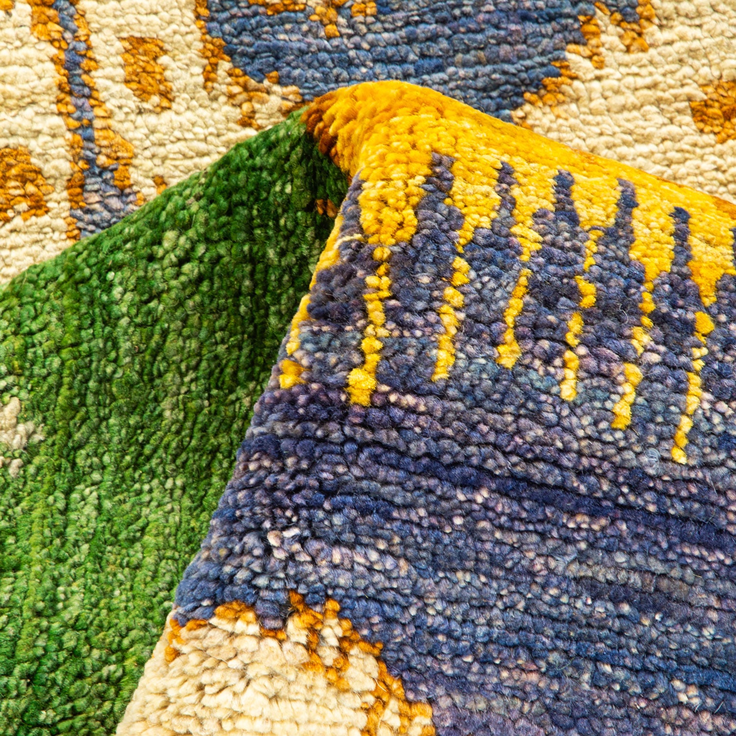 Vibrant and textured close-up of a colorful textile rug.